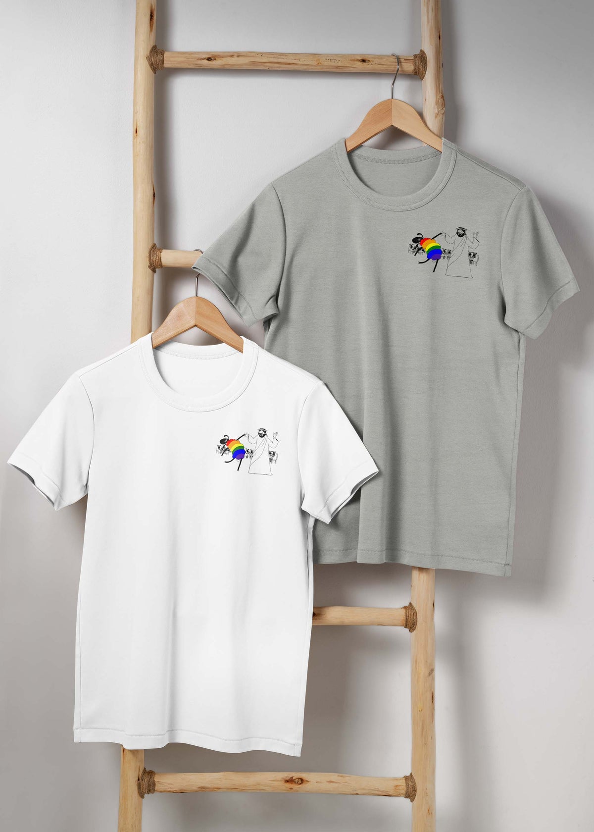 Grey and White Jesus Dancing with LGBTQ Sheep T Shirtso n hangers
